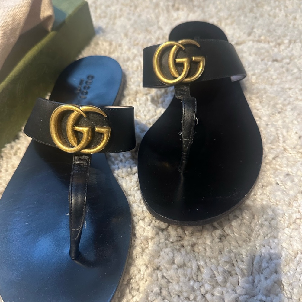 Gucci Black Slides with Embossed Bee Design